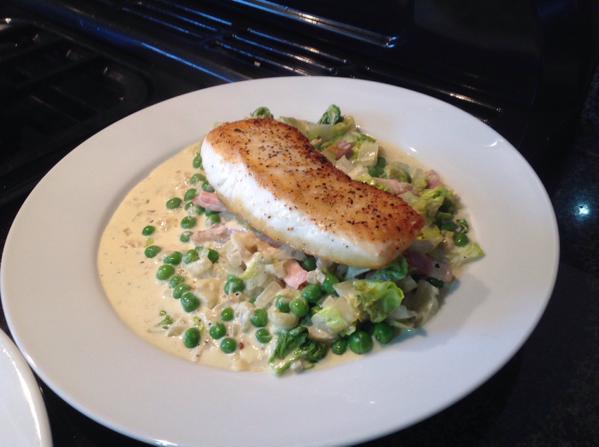 Halibut with creamed peas, bacon and scallions